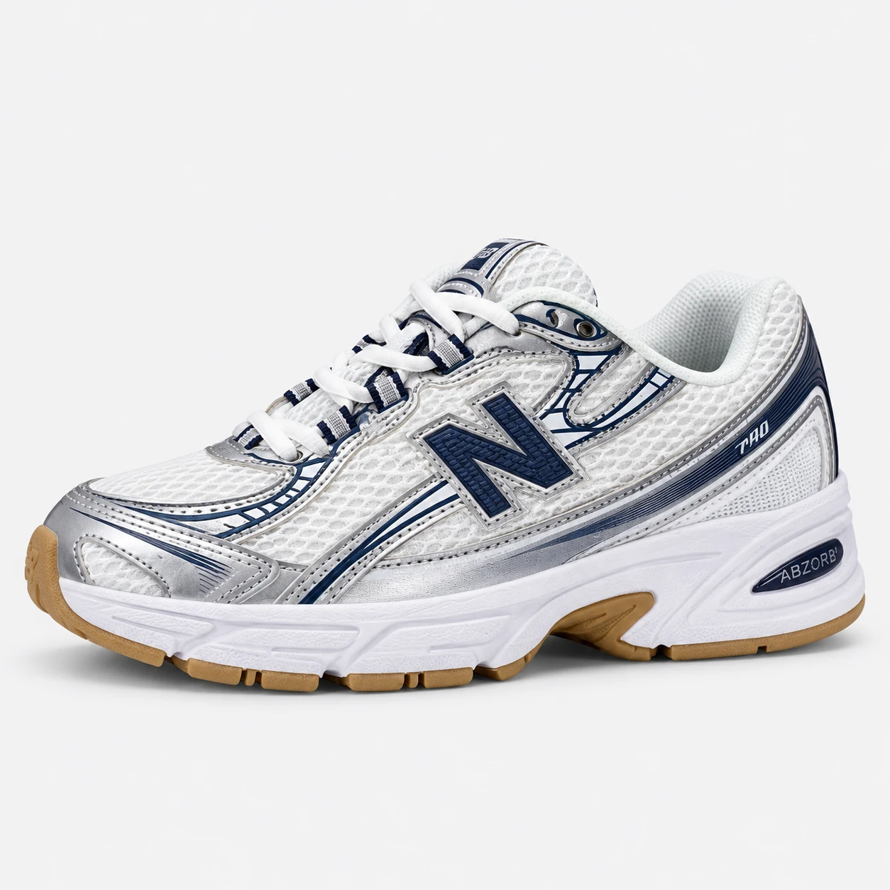 New Balance 740 — White / Silver / Navy / Gum White / Silver / Navy / Gum low-top sneaker with lace-up fastening, layered panels and visible N branding. Browse both the cleaned catalogue image and original supplier photo, and select your UK size from 3 to 9.