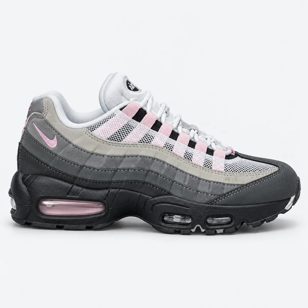 Nike Air Max 95 — Grey / Black / Pink Grey / Black / Pink low-top sneaker with lace-up fastening, layered panels and visible Swoosh branding. Browse the cleaned catalogue image and original supplier photo, and select your UK size from 3 to 9.